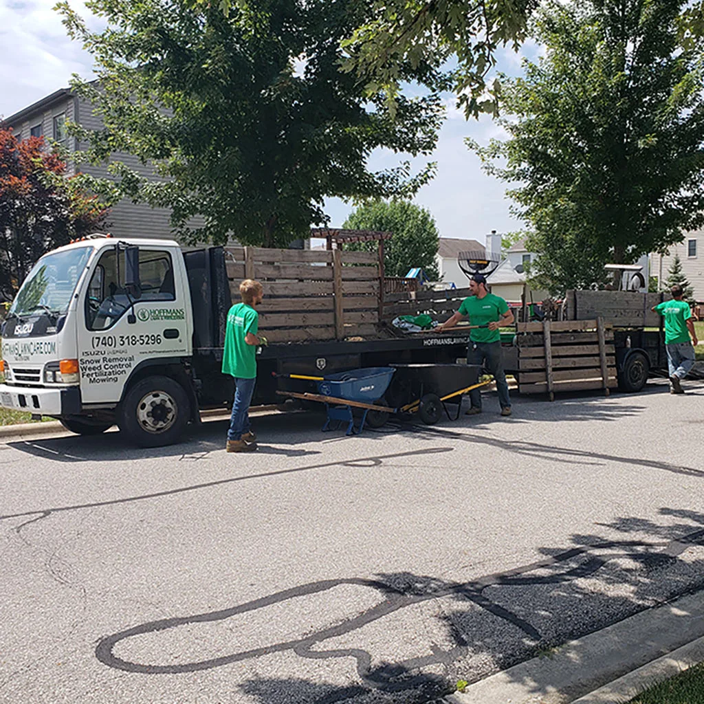 Workers from Hoffman  beside work truck in Lewis Center, OH.