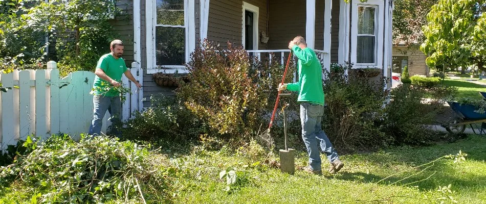 Crew cleaning up debris from a yard in Delaware, OH.