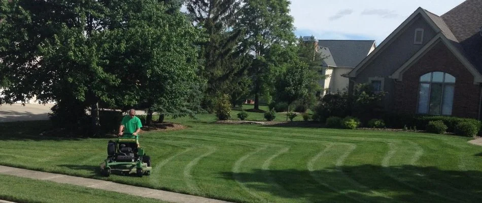 Crew mowing a lawn in Liberty Township, OH.