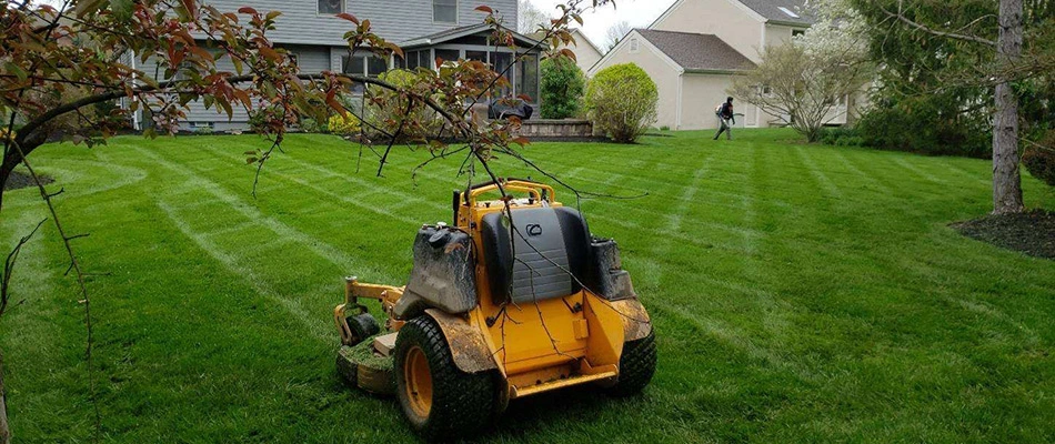 Mower in a lawn with patterns added in Powell, OH.